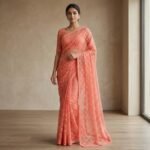 Peach Coral Floral Embroidered Net Saree with Matching Blouse